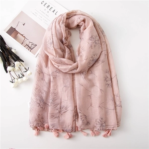 Light pink cotton linen scarf with grey dandelion print and fringe tassels on white background