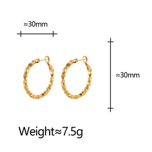 Detailed view of 30mm golden textured hoop earrings with dimensions and weight specs