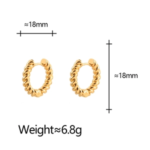 Golden twisted hoop earrings 18mm diameter weighing 6.8g with minimalist polished finish