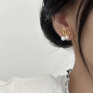 Elegant golden rabbit pearl earrings for women with high-quality polished finish
