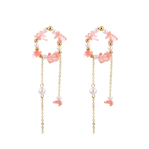 Sweet pink stone and pearl tassel earrings with golden chain in a minimalist style