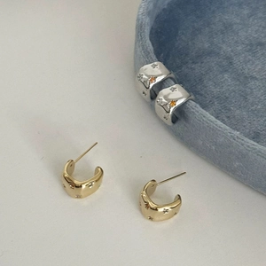 Chic star engraved C-shape hoop earrings with zircon stones in gold and silver finish