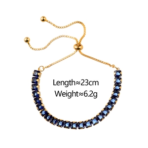 Elegant gold adjustable bolero bracelet featuring deep blue square zircon gemstones