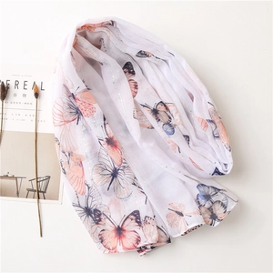 White scarf with butterfly print and silver glitter thread for summer beach vacations