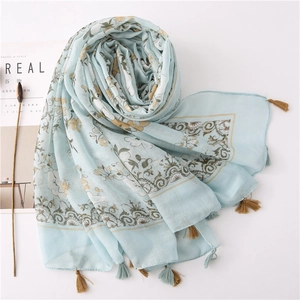 Blue floral cotton linen scarf with tassel edge, perfect for summer beach sun protection