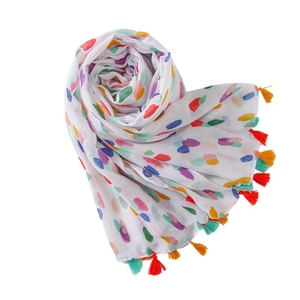 Colorful polka dot linen cotton scarf with decorative tassels for beach travel and art style