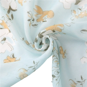 Light blue floral cotton linen scarf with elegant white patterns for beach sun protection