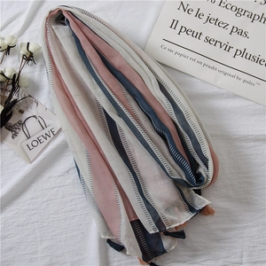 Linen stripe scarf in pink and blue with elegant tassels for spring beach wear