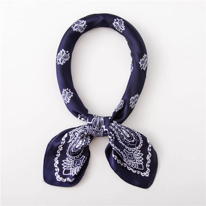 Navy blue silk paisley bandana with satin finish and white floral patterns