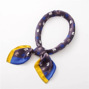 Detail of satin square scarf with geometric horse print and colorful border