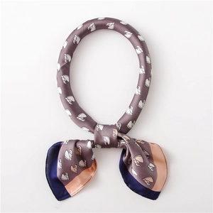 Detail of satin square scarf with nautical equestrian print and multi-color silk finish