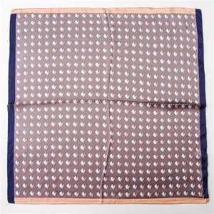 Detailed flat lay of a satin square scarf featuring floral prints and multi-color borders