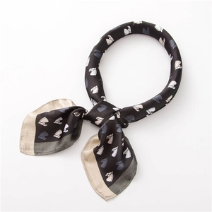 Detailed view of the silk satin neckerchief featuring retro horse head pattern and contrast border