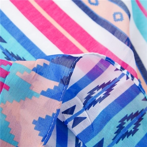 Macro detail of bohemian geometric pattern on soft cotton linen ethnic scarf fabric