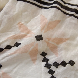 Ethnic style beige shawl with light pink star pattern and plaid fabric details