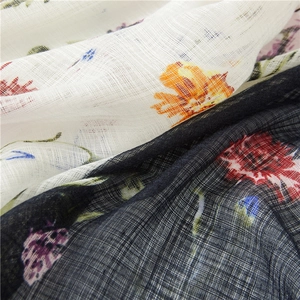 Floral print cotton linen scarf with tassels in beige and navy blue for women