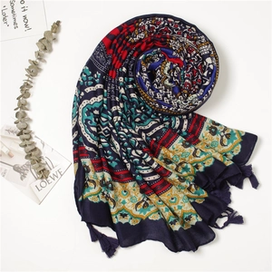 Ethnic style blue printed shawl with floral patterns and tassels for beach vacations
