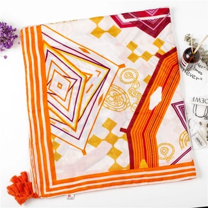 Yellow geometric cotton linen scarf with orange tassels and bohemian diamond pattern