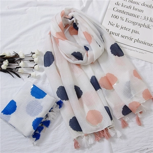 Linen cotton scarf with pink and navy polka dots and fringe tassels for sun protection