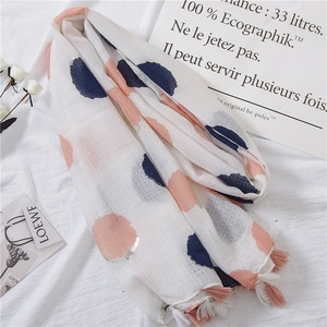 Lightweight cotton linen scarf with pink and navy polka dots and fringed tassel edges
