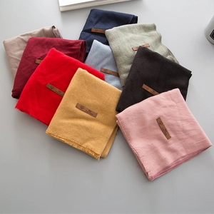 Sciarpe per bambini in morbido cashmere con nappe e logo in pelle, vari colori