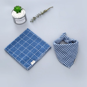 Detail of blue and white checkered cotton baby bandana scarf with fine edge stitching
