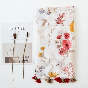 Artistic floral print linen shawl with fringe tassels and watercolor flower patterns
