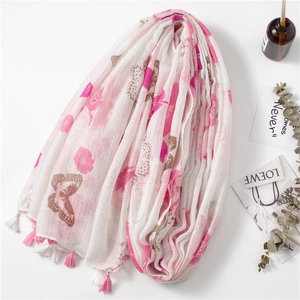 Écharpe en coton et lin à imprimé papillon rose avec finitions à pompons