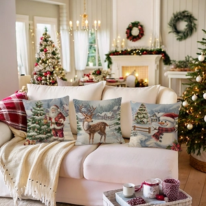 Three-piece Christmas linen cushion covers featuring Santa Claus and Snowman on a sofa