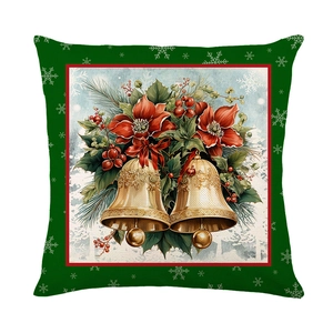 Christmas pillow cover with festive gold bells and red flowers on dark green faux linen