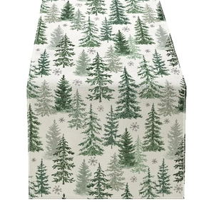 Christmas table runner featuring green pine trees and snowflakes on a linen-textured fabric