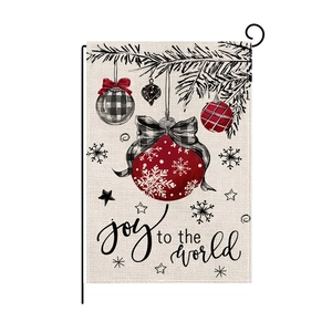 Christmas garden flag with Joy to the World text on white linen and black metal stand