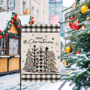 Christmas garden flag with buffalo plaid, snowy outdoor scene and Merry Christmas text