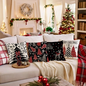 Set of four festive Christmas pillow covers with reindeer and tree patterns for sofa decor