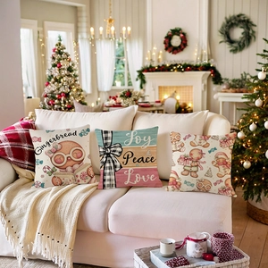 Three Christmas gingerbread man pillow covers featuring Joy Peace Love patterns for home decor