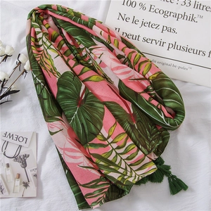 Pink cotton linen scarf with green tropical palm leaf print and elegant tassels