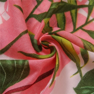 Pink cotton linen tropical leaf print scarf with tassels for sun protection and beach wear