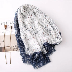 Lightweight cotton linen scarf with floral bird print and fringe trim for beach sun protection