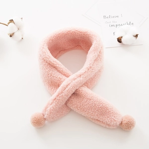 Soft pink plush scarf for kids featuring fluffy pom-poms and warm faux lamb wool texture