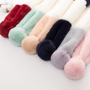 Soft plush cross scarves with pom-poms for children in multiple pastel colors