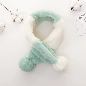 Detail of plush faux rabbit fur scarf showing mint green and beige contrast and soft texture