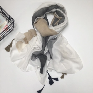 Close-up of color-block cotton long scarf with fringes in white, grey and camel tones