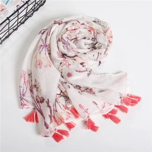 White cotton linen scarf with floral prints and pink tassels for sun protection