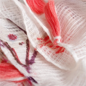 White cotton linen floral scarf with red fringe tassels for summer sun protection