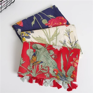 Twill cotton floral scarf with magpie print and tassels in blue, white, and red