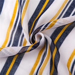 Close-up of yellow and navy striped linen-blend scarf fabric showing detailed weave texture