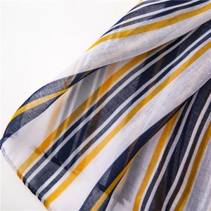 Close-up of navy blue and yellow striped cotton linen fabric with fine texture