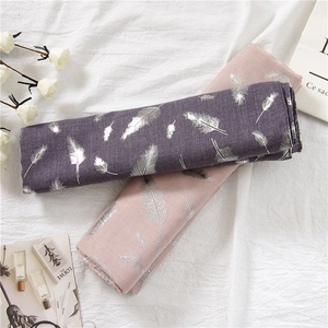 Elegant cotton linen scarves featuring silver metallic feather prints in grey and pink