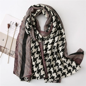 Houndstooth cotton linen scarf with red lace paneling and minimalist prop styling