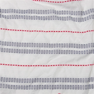 Detail of white cotton linen fabric with red stitching and blue-grey striped texture